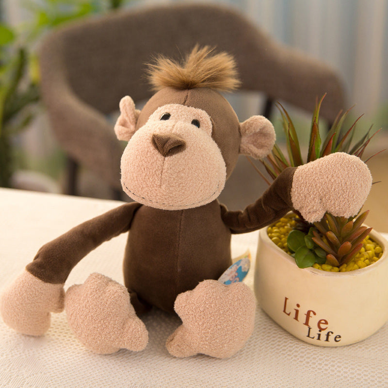 Momo le Singe en Peluche – L’acrobate de votre canapé